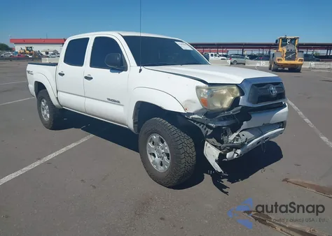 2014 Toyota Tacoma Double Cab z USA, uszkodzony, nr VIN 5TFLU4EN1EX106582